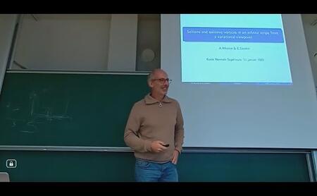 Étienne Sandier -  Solitons and solitonic vortices in an infinite strip from a variational viewpoint